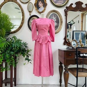 Vintage-Inspired Pink Peplum Midi Dress
